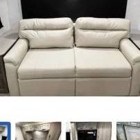 NEW Creme Loveseat / Bed for RV. Folds out into bed