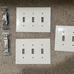 3 Single toggle light switches and 3 wall plates