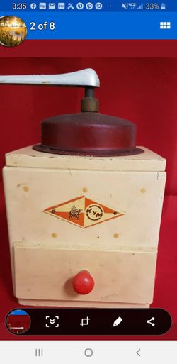 Vintage KYM wooden 125th anniversary coffee grinder.