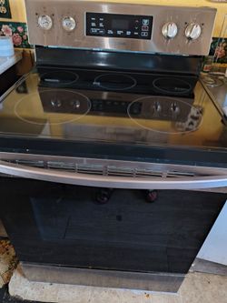 Stove for sale; needs repair.