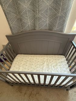 Baby crib with mattress