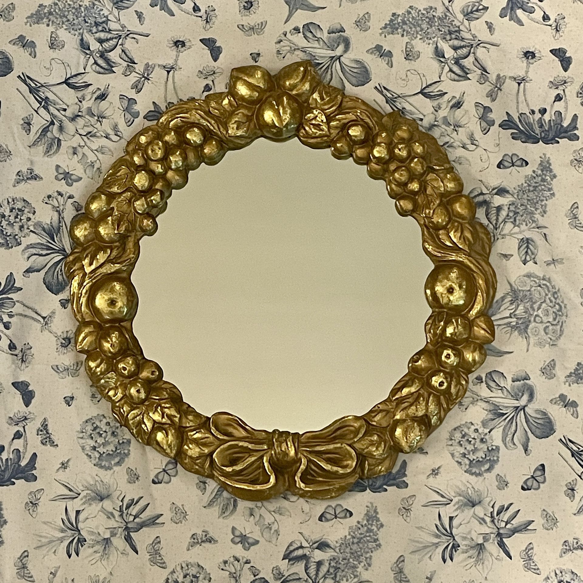 Vintage 15” H Gold Gilt Fruit and Bow Mirror
