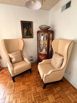 Two beige leather couch, chairs