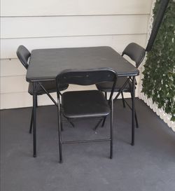 Foldable Table and 3 chairs ok condition
