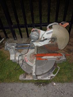 Rigid dual bevel miter saw
