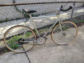 Silver Nishiki fast single speed road bike w bullhorn