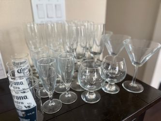 Set of glasses for champagne, wine, beer, and martinis. Price for the whole set is $15.