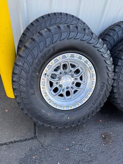 NEW 17x9 ARENA wheels wrapped in 35x12.50r17 atturo A/T tires