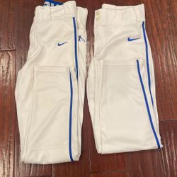 2 Used Youth Large Nike Vapor White With Blue Side Piping 