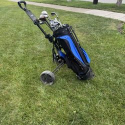 Golf Cart And Golf Clubs