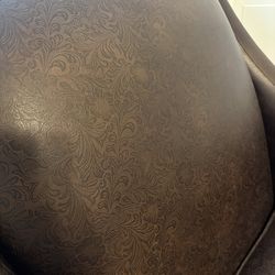 Brown leather armchair