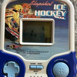 MGA Slapshot Ice Hockey Handheld Electronic game