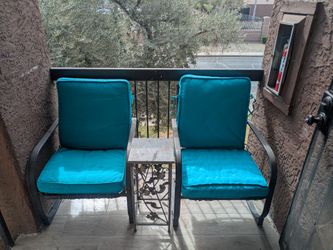 Patio chairs with small tables