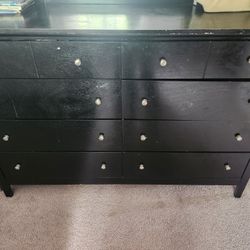 Black dresser With Marrior