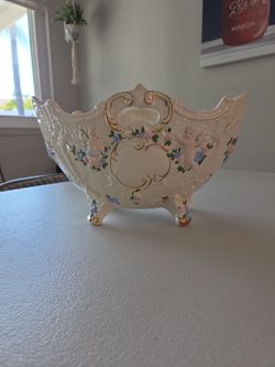 Porcelain Footed Bowl with Cherubs and Floral Detail