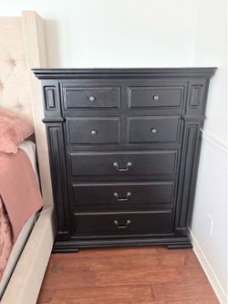 Fancy black tall boy dresser