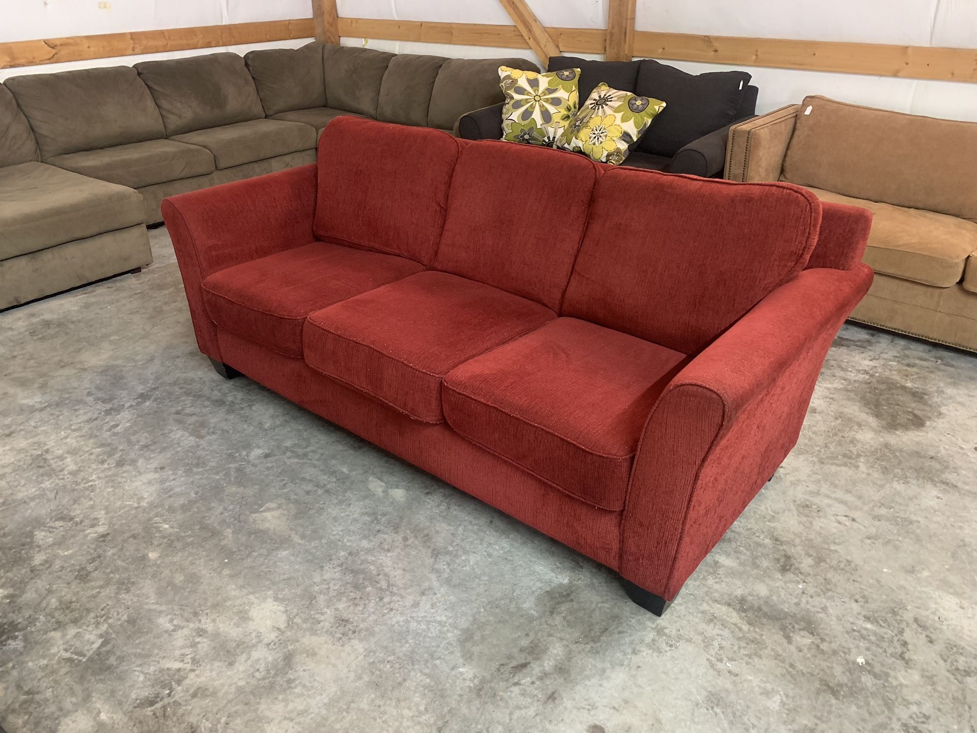 Red Couch “WE DELIVER”