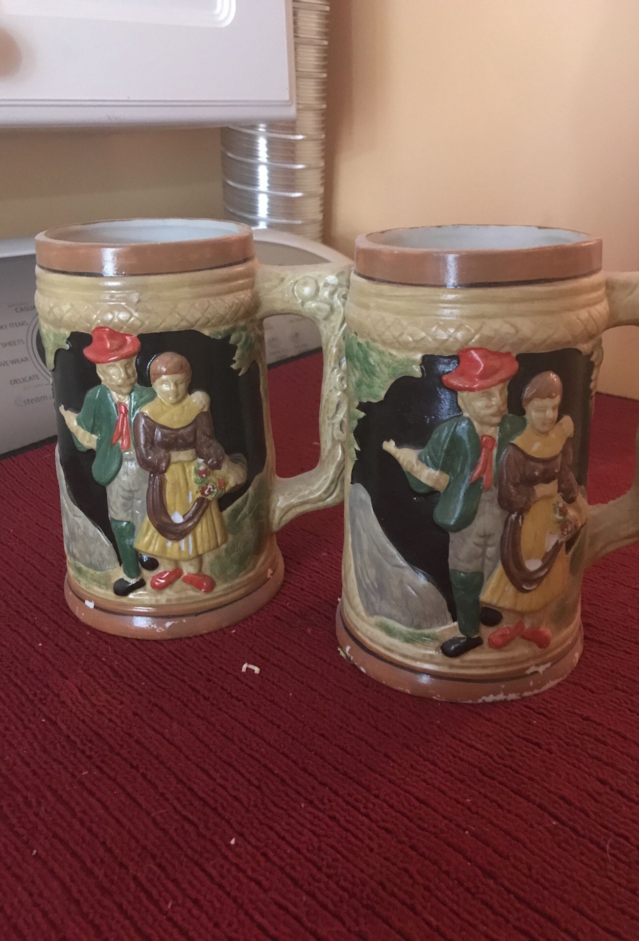 2 antique mugs