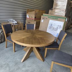 New Costco Dining table set Zealand 54" Round Dining Table and 4 Chairs

The stylish and functional design is constructed from Rubberwood solids with 
