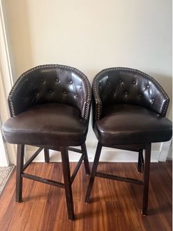 Brown tufted leather barstools