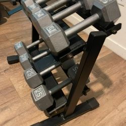 In NEW Condition Set Of Cast Iron Hex Dumbbells 5s, 10s, 15s 20s  And  25s  (NO RACK iNCLUDED)