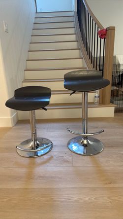 Two contemporary bar stools adjustable height
