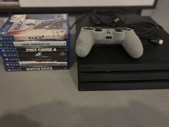 PS4 PRO 1TB + Controller + 7 Games