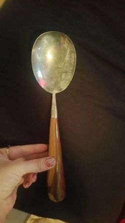 Large I believe sterling silver plated large wood spoon.