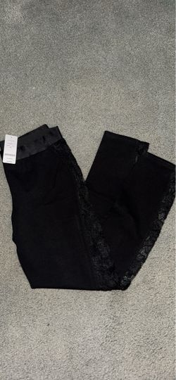 Brand new + tags women’s Bebe sexy lace tux black leggings (size medium)
