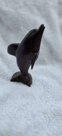 Vintage ironwood dolphin sculpture
