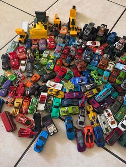 Lot of assorted toy cars and trucks