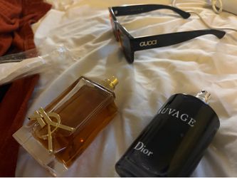 Two fragrances and designer glases