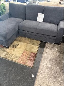 2 Piece Sectional with pull out bed & storage Chaise on Sale