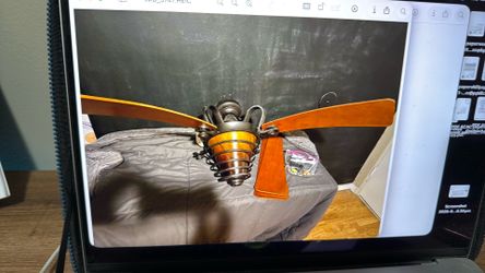Designer, Harbor breeze, ceiling, fan oil, rubbed bronze, and Amber glass
