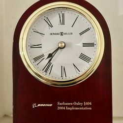 Sarbanes-Oxley 404 The clock in the image is a Howard Miller clock, which appears to be a promotional or commemorative item from Boeing. 