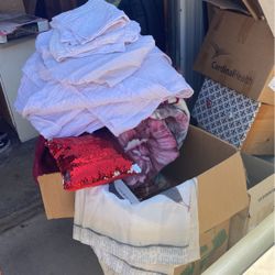 Box Full Of Sheets And Blankets 