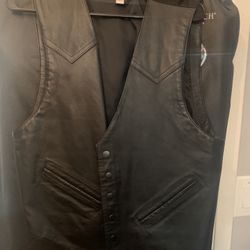 Black leather vest, size large. never been worn. 