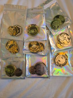 Pokemon coins, pins, and markers