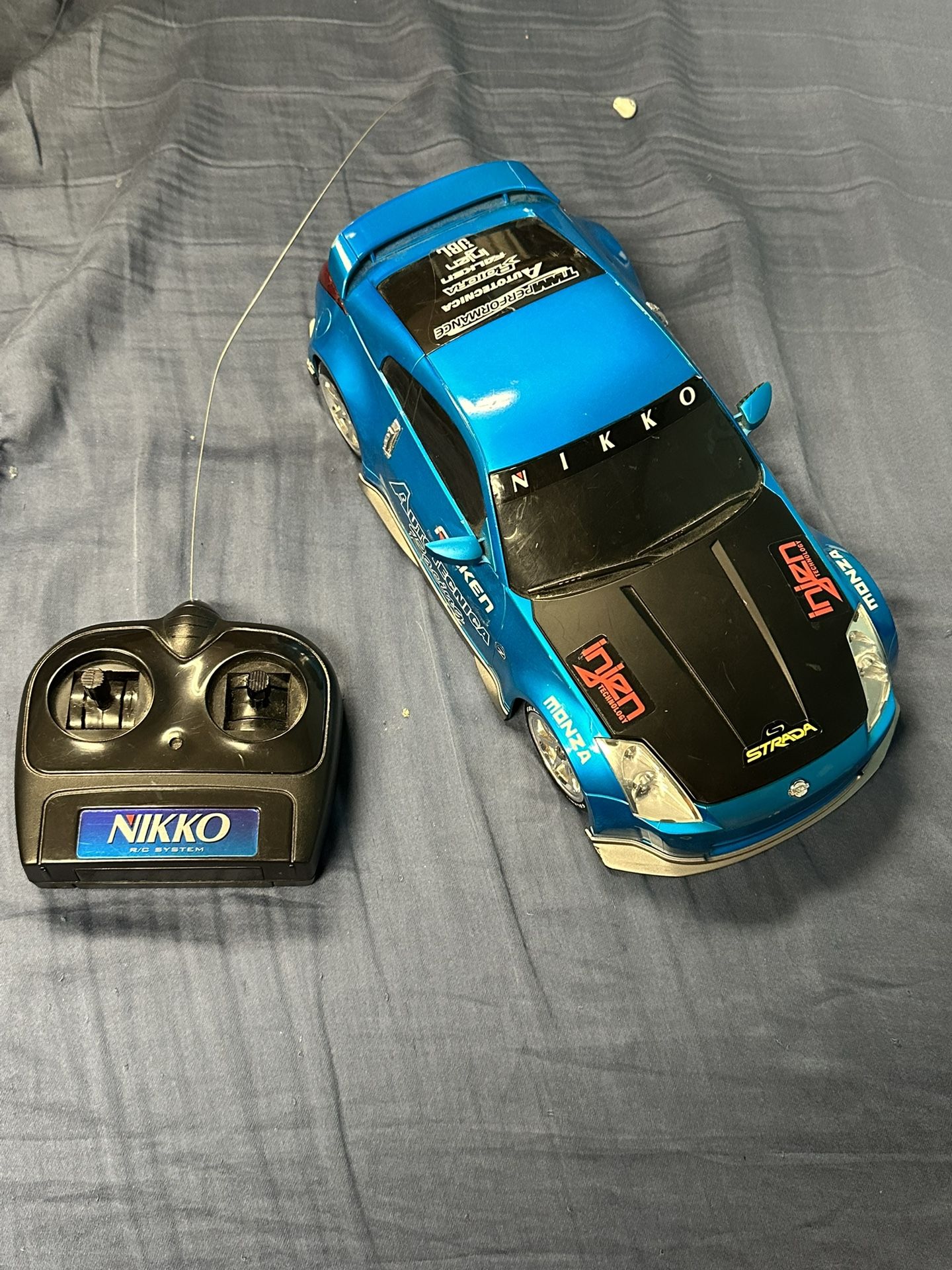 Nikko 2005 Nissan 350z RC Car . WITH REMOTE. TESTED AND WORKING