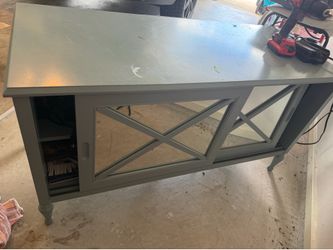 Tv stand with dvds and dvd player