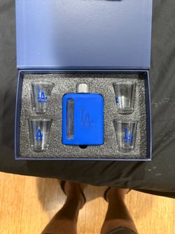 Flask and shot glasses