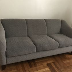 Cozy Grey Three-Seater Sofa