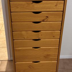 Eight Drawer Rolling Wooden Dresser With Locking Wheels 