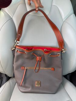Dooney & Bourke Taupe Leather Drawstring Bucket Bag with Brown Trim
