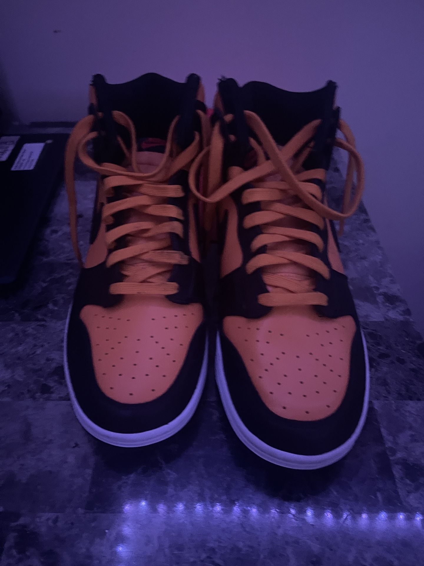 Yellow and black Jordans high