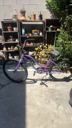 Purple beach cruiser bike bicycle