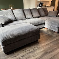 Selling modular U-shaped corner sectional sofa with two ottomans. Great condition.