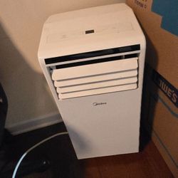 Indoor AC Unit with hose. 