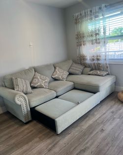 2 Piece Bobs Furniture Sectional with pop up sleeper