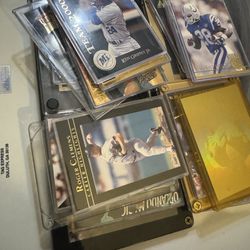 Mixed lot of 26 sports cards rookies and inserts including 2 rare action packed 24k gold inserts 